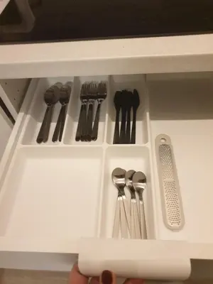 a drawer with knives and utensils in a cabinet at Appartamento La Doriana in Rome