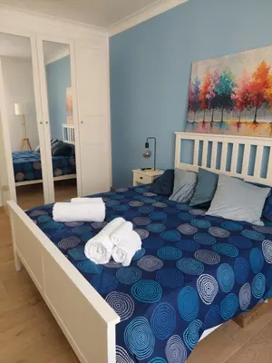 a bedroom with a bed with towels on it at Casa Bibbi in Rome