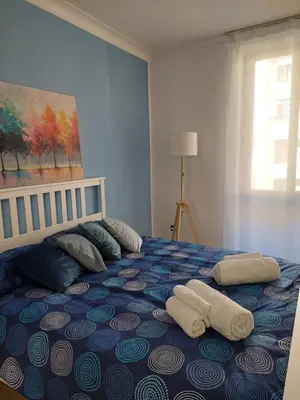 a bedroom with a bed with two pillows on it at Casa Bibbi in Rome