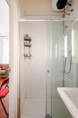 a bathroom with a shower and a sink at Loft Torlonia in Rome center town in Rome