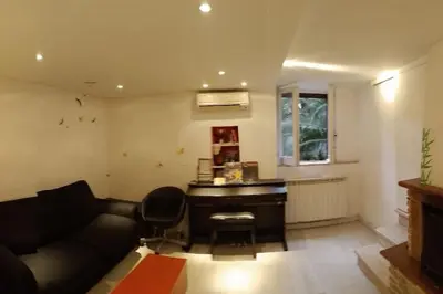 a living room with a couch and a piano at Little Villa Well connected in Rome