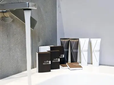 a group of boxes sitting on a table at Angelico 70 - Amazing flat near the Vatican Museum in Rome