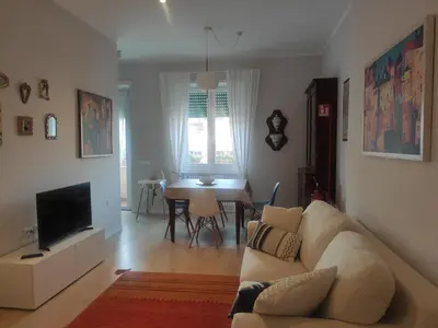 a living room with a couch and a table at Anna Lucia's Flat vicino a Trastevere e al San Camillo in Rome