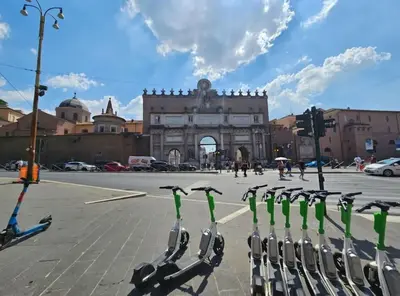 a group of bikes parked in a parking lot at Gabri 19 - Elegant Escape in Piazzale Flaminio in Rome