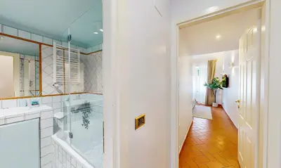 a bathroom with a shower and a sink at Valery - Appartamento Glam vicino al Vaticano in Rome
