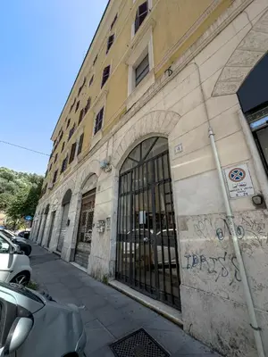 a building with an entrance to a parking lot at Casa Vanvitelli - Testaccio in Rome