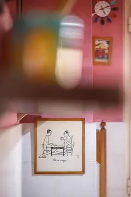 a picture of two people sitting at a table at Olimpico Apartment in Rome
