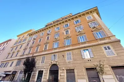 a large building with windows on the side of it at Vatican Luxury Apartment in Rome