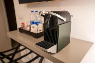 a hair dryer sitting on top of a counter at Cicerone's Luxury Suites in Rome
