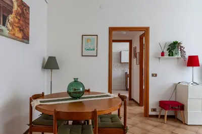 a dining room with a table and chairs at giovanni house roma in Rome