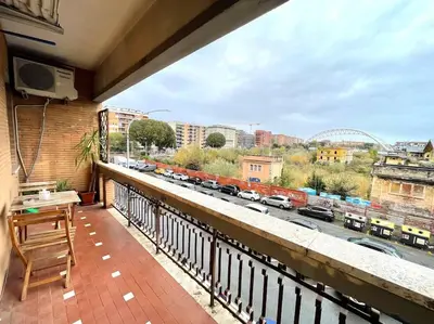 a balcony with a view of a city at Piramide Experience in Rome