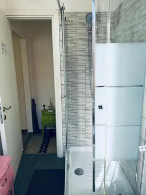 a shower with a glass door in a bathroom at Home Sweet Rome Vatican in Rome