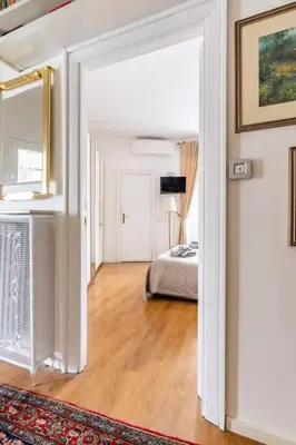 a room with a bedroom with a bed in it at Vatican Almond Tree Penthouse in Rome