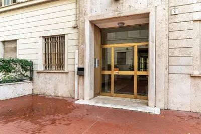 an entrance to a building with a glass door at Vatican Almond Tree Penthouse in Rome