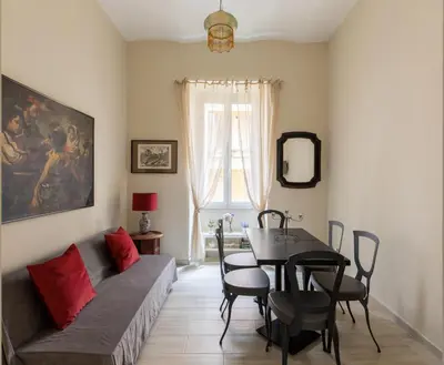 a living room with a couch and a table at Alloggio Machiavelli 59 in Rome