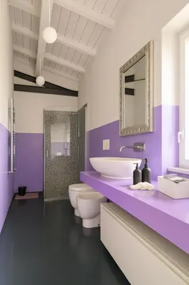 a purple bathroom with two toilets and a sink at Stylish duplex with terrace Rome in Rome