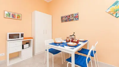 a kitchen with a sink and a stove top oven at Rental in Rome Sistina View in Rome