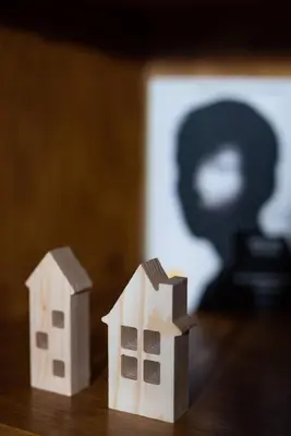 two toy houses sitting on top of a table at RomAntica Bocca della Verità in Rome