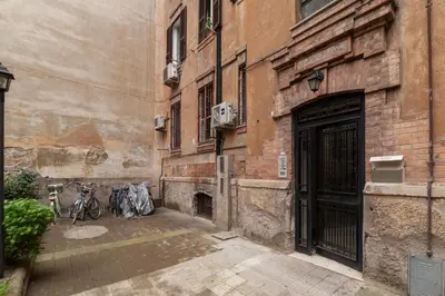 an alley with bikes parked next to a building at GuestHost - Lungotevere central and bright apartment in Rome