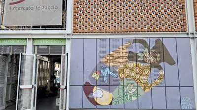 a mural of a bird on the side of a building at GuestHost - Lungotevere central and bright apartment in Rome