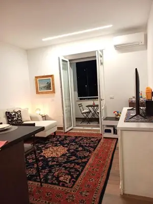 a living room with a couch and a table at Soraya Home in Rome