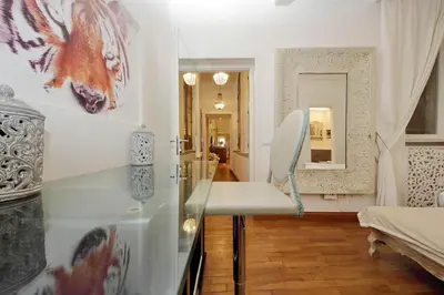 a room with a glass counter with a chair in it at Vicolo Savelli Luxury Suites in Rome