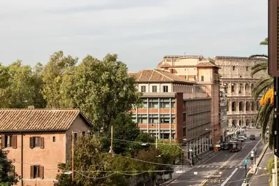 a view of a city street with buildings at colosseo view apartment in Rome