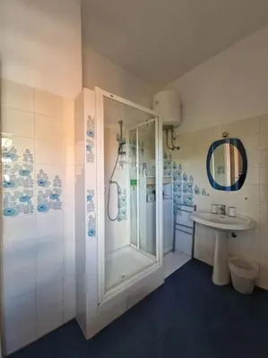 a bathroom with a shower and a sink at casa a PortaPortese in Rome