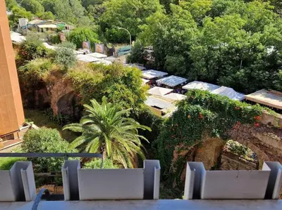 an overhead view of a building with trees and bushes at casa a PortaPortese in Rome