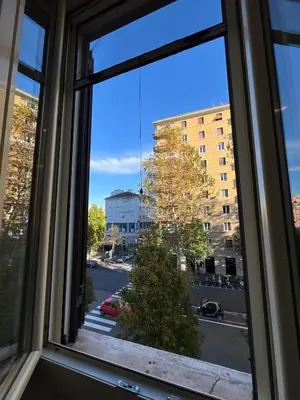 a window with a view of a street at Maison Trionfale a 2 passi dal Vaticano in Rome