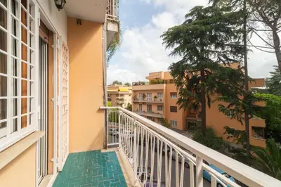 a balcony with a view of a building at Casa Eva - Roma in Rome
