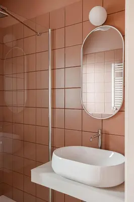 a bathroom with a sink and a mirror at 4BNB - Suites del Gallo in Rome