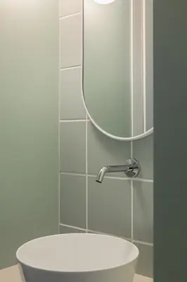 a bathroom with a sink and a mirror at 4BNB - Suites del Gallo in Rome
