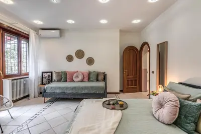 a living room with a couch and a table at La Casa di Cesare in Rome