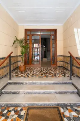 an empty lobby with a tile floor at Sognando Vacanze Romane in Rome