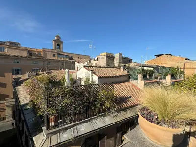 a view of a city with plants and buildings at Pantheon Gabbianina Home in Rome