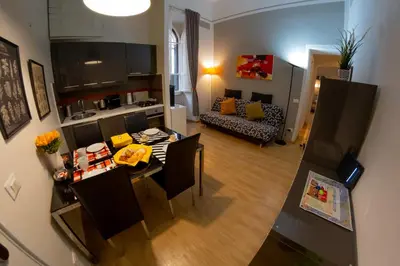 an overhead view of a living room and a dining room at Palestro Apartments in Rome