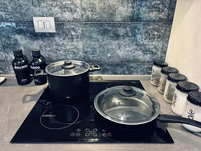 a pot on top of a stove in a kitchen at Roma Elena in Rome