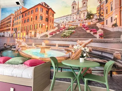 a city street with a fountain peel and stick wall mural at Roma Elena in Rome