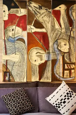 a room with a wall with drawings on it at Art Gallery House, San Giovanni, Roma Centro - Wifi AC Smart TV in Rome
