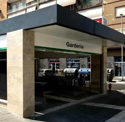a car dealership with a car parked in a building at Domus Passerini in Rome