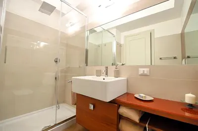 a bathroom with a sink and a shower at Il Giardino della Musa in Rome
