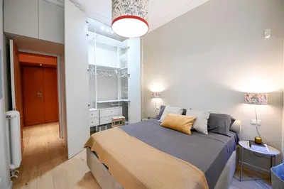 a bedroom with a large bed in a room at Il Giardino della Musa in Rome