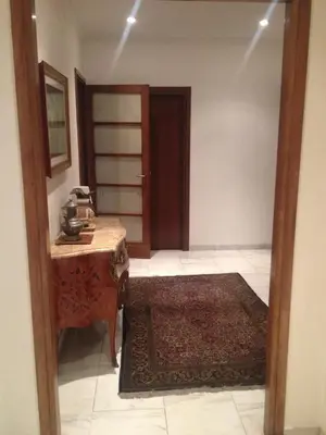 an entrance to a room with a table and a door at B&B Classy Rome in Rome