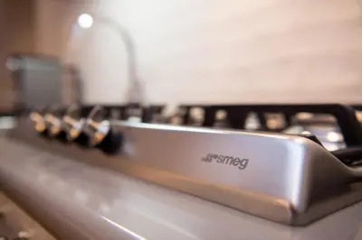 a close up of a kitchen counter with a sink at Casa Belsiana in Rome