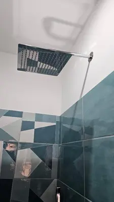 a bathroom with a shower with a glass wall at Vacanze Romane da Manuela in Rome