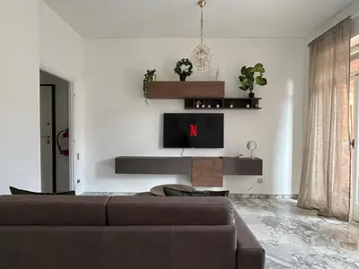 a living room with a couch and a tv at 5Piano Ascensore Near Vaticano Ideale per Famiglie in Rome