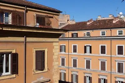 a group of buildings next to each other at iFlat Charming Vintage Apartment in Esquilino in Rome