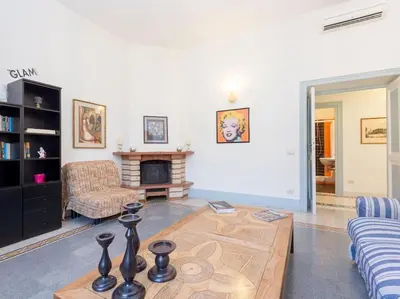a living room with a couch and a coffee table at Vatican Comfortable Sunny Apartment in Rome