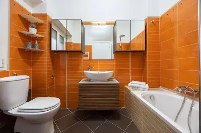 a bathroom with a toilet and a sink and a tub at Vaticano84 Gemelli in Rome